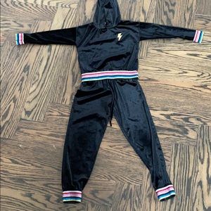 Valore jumpsuit rainbow bottom ankle and wrists